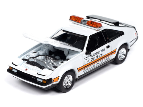 1983 Toyota Celica Supra - White w/Toyota Grand Prix of Long Beach Official Pace Car Graphics &amp; Roof Lightbar Auto World Premium 6 Car Assortment 2024 Release 2 Mix B - Big J's Garage